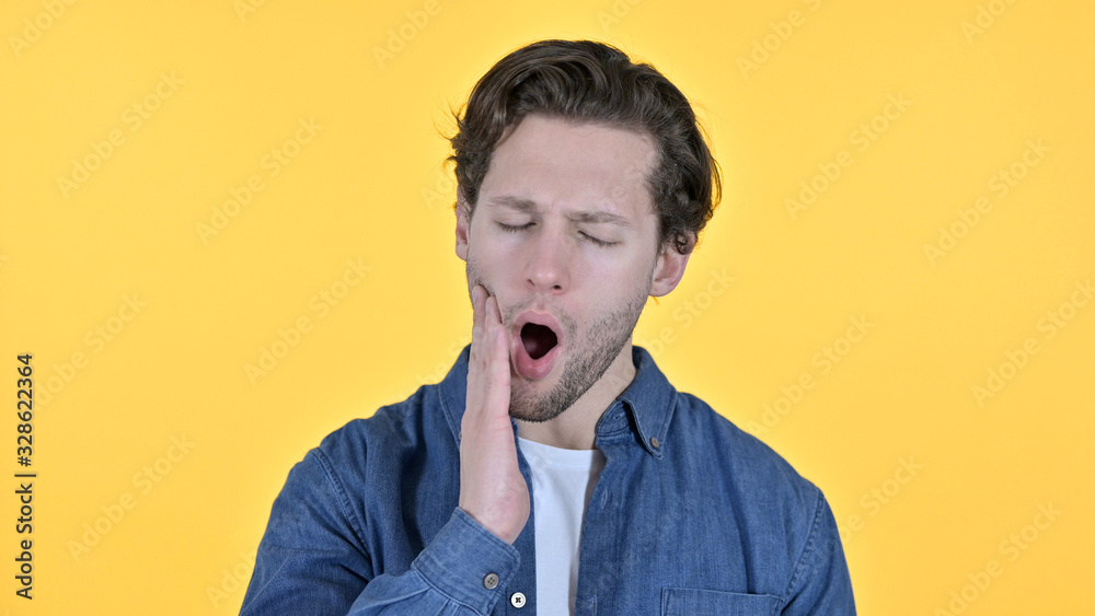 Portrait of Young Man with Toothache on Yellow Background Portrait of Young Man with Toothache on Yellow Background