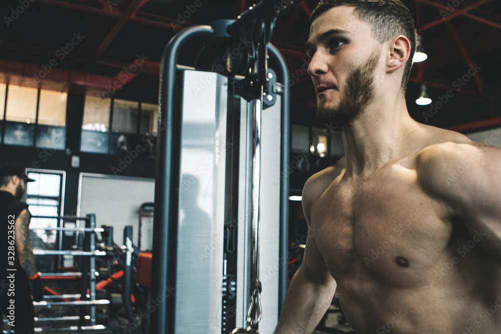 handsome bearded guy training in a gym handsome bearded guy training in a gym