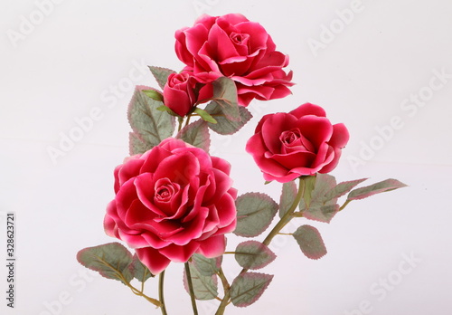 Fototapeta Naklejka Na Ścianę i Meble -  Red colorful textile rose closeup