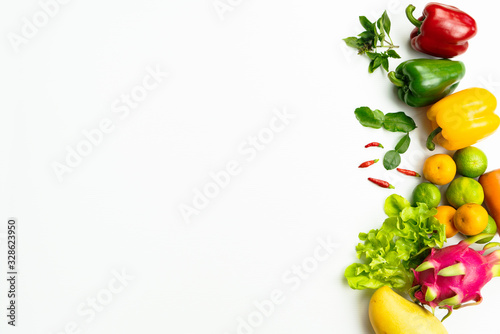 Fresh fruit and vegetable. Flat lay of fresh raw organic vegetables on white background