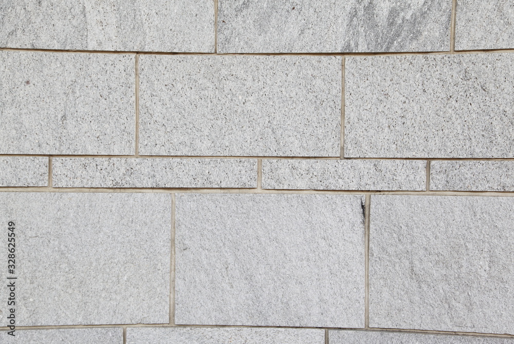 Obraz premium Gray stone wall closeup background photo texture