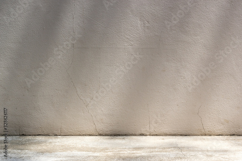 Fototapeta Naklejka Na Ścianę i Meble -  White concrete wall background with sunlight shading