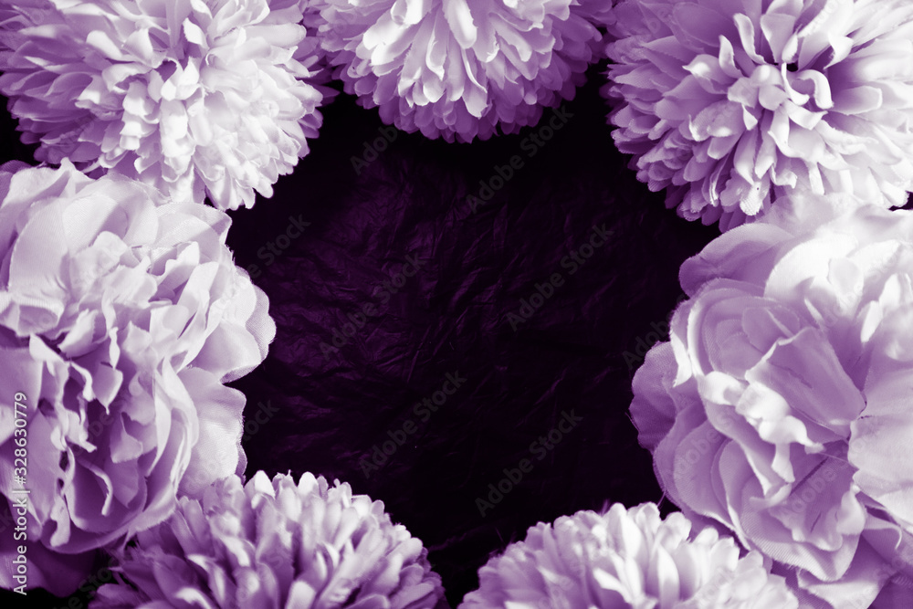 Obraz premium Beautiful abstract color blue pink and purple flowers on black background and blue graphic white flower frame and pink leaves texture, purple background, colorful graphics banner 
