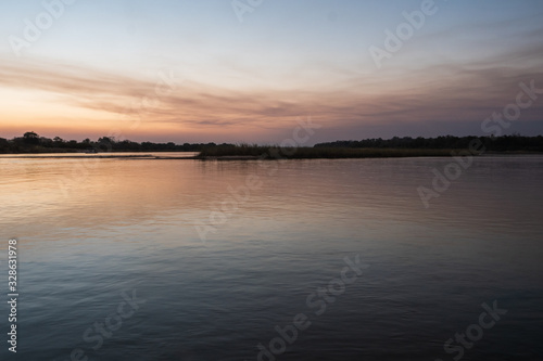 Serene, Tranquil Okavango River Landscape at Dusk