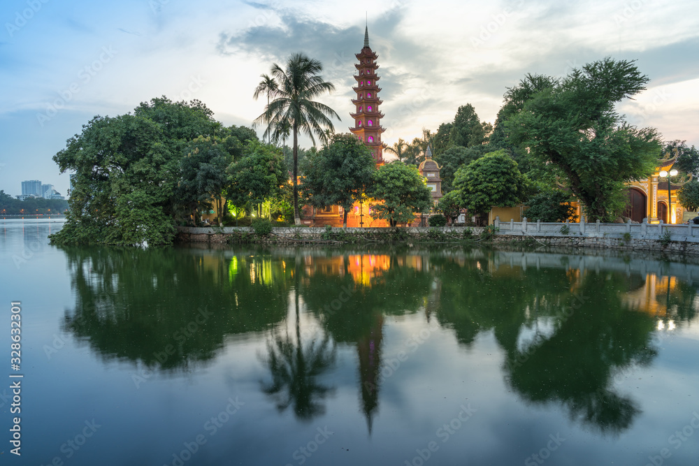 Tran Quoc pagoda during sunset time, the oldest temple in Hanoi, Vietnam. Hanoi cityscape. Tran Quoc pagoda during sunset time, the oldest temple in Hanoi, Vietnam. Hanoi cityscape.