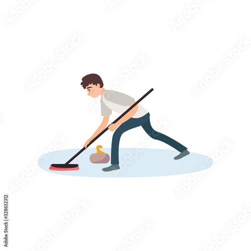 An athlete in gray clothes on the ice is rubbing the floor with a brush, thus pushing a stone.