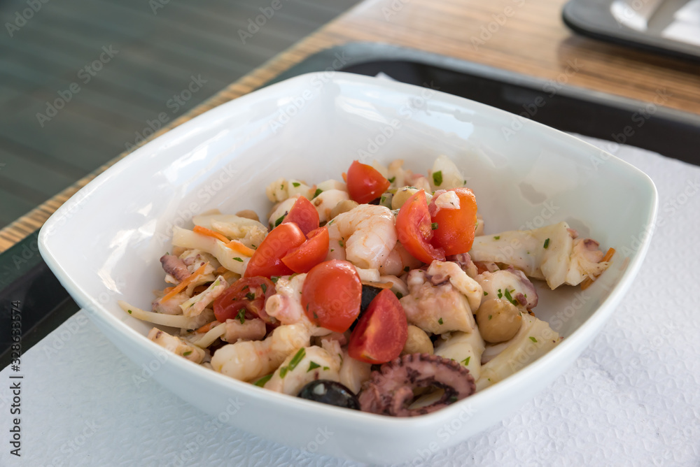 Fish salad with tomatoes and olives Fish salad with tomatoes and olives