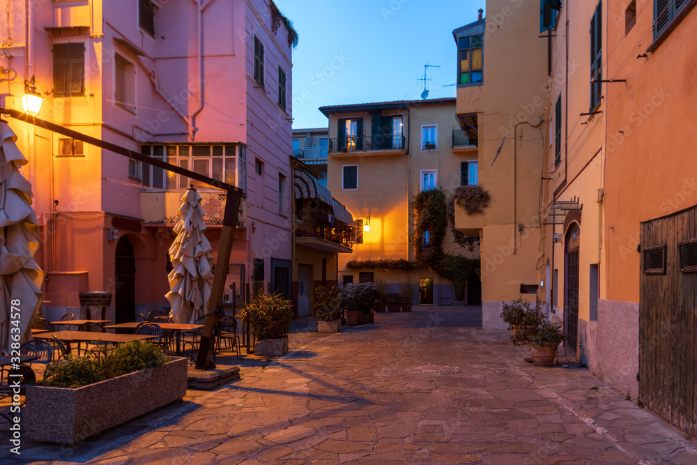 Night scene in the old town of Imperia, Italy