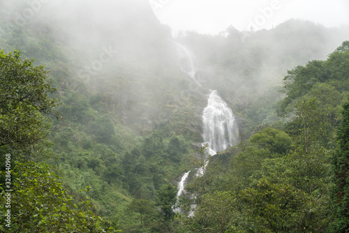 Fototapeta Naklejka Na Ścianę i Meble -  Thac Bac Waterfall (Silver Falls) on misty jungle in Sapa, Northern Vietnam
