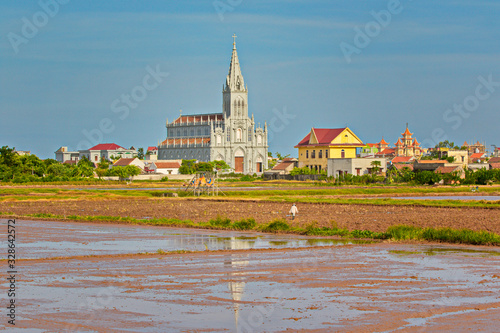 BACH LONG, GIAO THUY, NAMDINH, VIETNAM - JULY 10, 2016: A very nice cathedral in a village photo