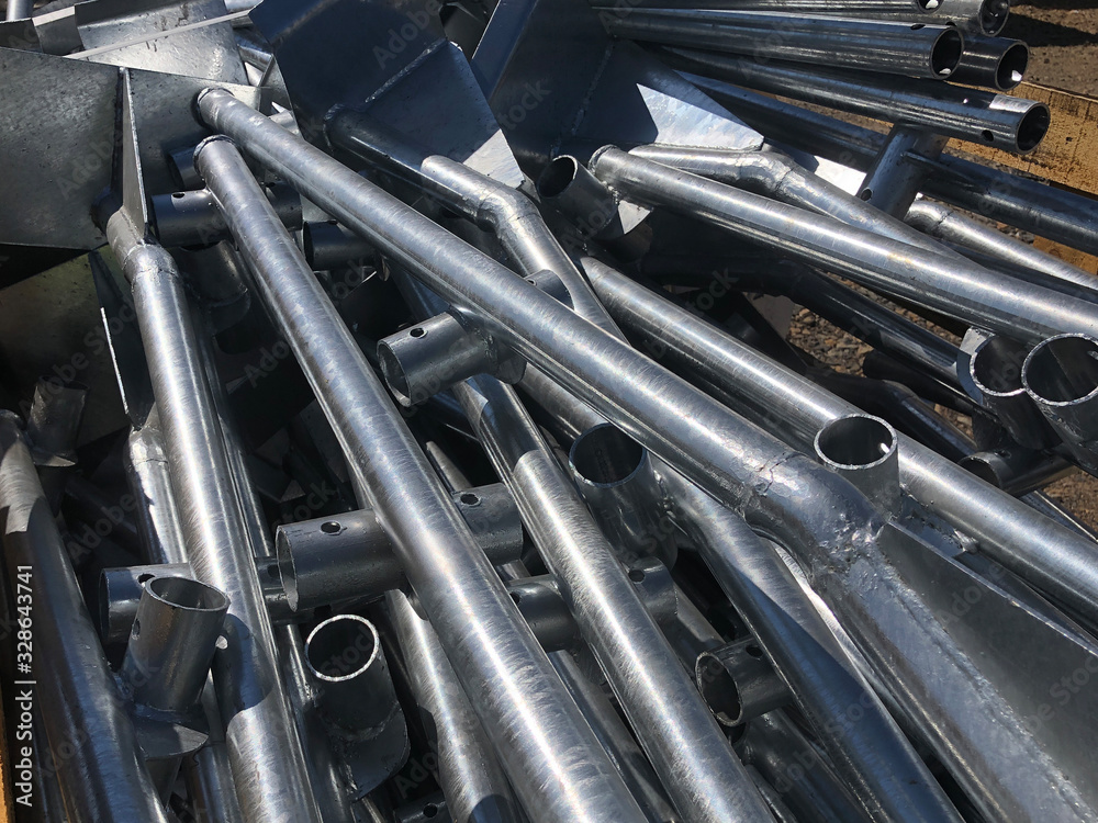 Chrome plated formwork supporting metal pipes in the box on the outdoor warehouse Chrome plated formwork supporting metal pipes in the box on the outdoor warehouse