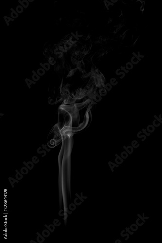 White smoke trickle texture on black background