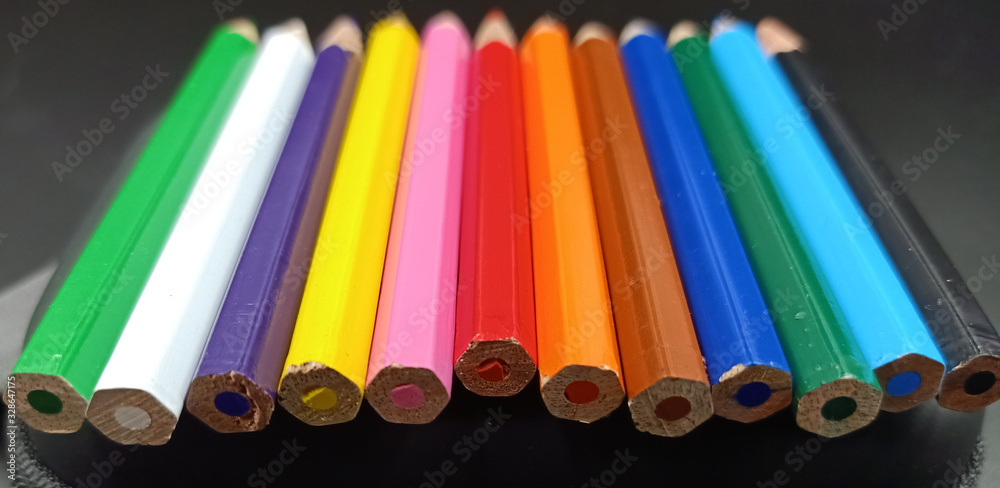 Color pencils on black background Color pencils on black background