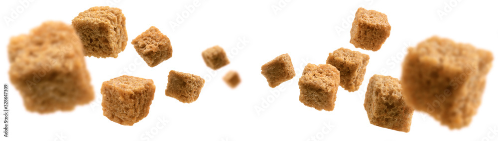 Bread croutons levitate on a white background Bread croutons levitate on a white background