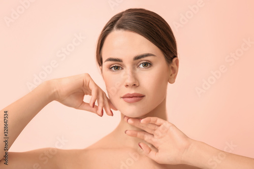 Beautiful young woman on co...