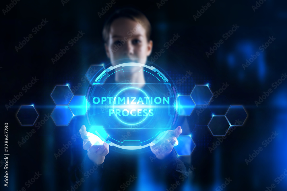 Business, Technology, Internet and network concept. Young businessman working on a virtual screen of the future and sees the inscription: Business, Technology, Internet and network concept. Young businessman working on a virtual screen of the future and sees the inscription: