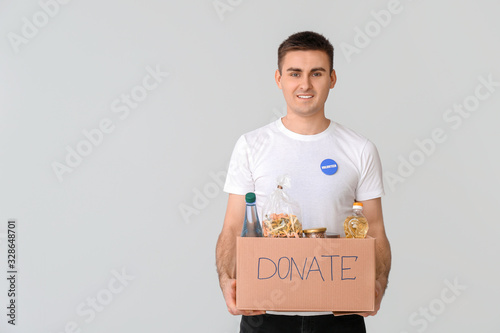 Volunteer with donations fo...