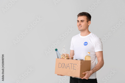 Volunteer with donations fo...