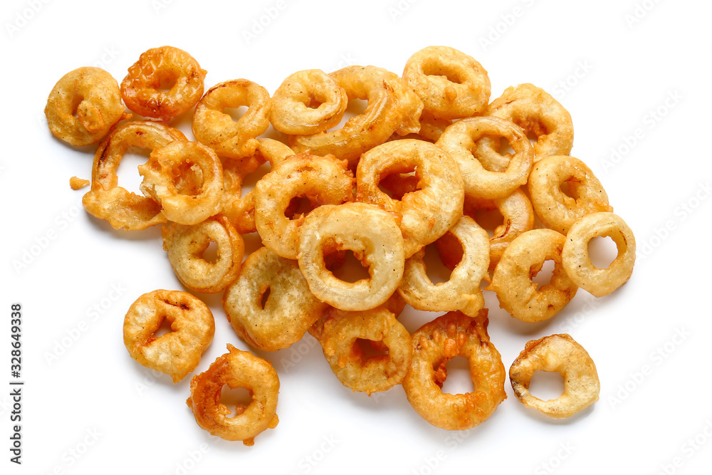 Crispy fried onion rings on white background