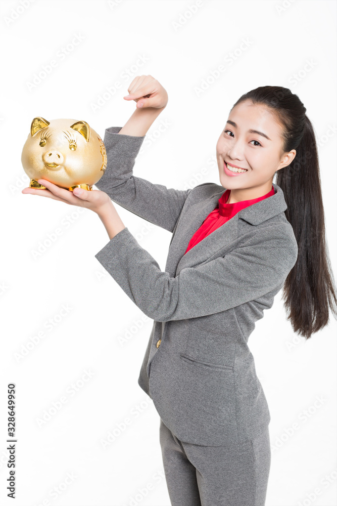 girl holding piggy bank girl holding piggy bank