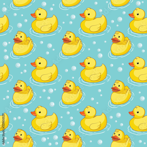 Vector seamless pattern with yellow ducks