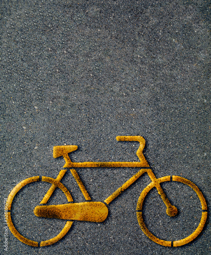 Paved cycle lane with yellow bicycle symbol