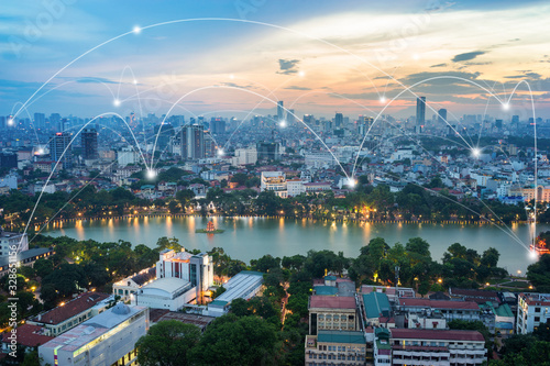 Smart city and wireless communication network concept. Digital network connection lines of Hanoi city at Hoan Kiem lake or Ho Guom