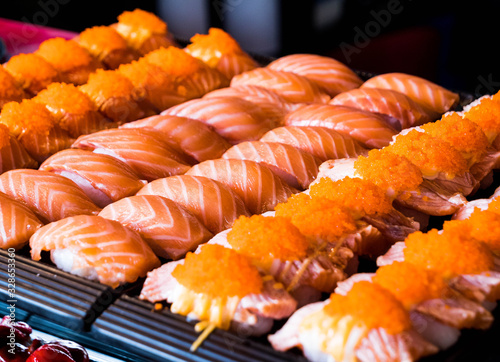 Salmon sushi arranged in a tray