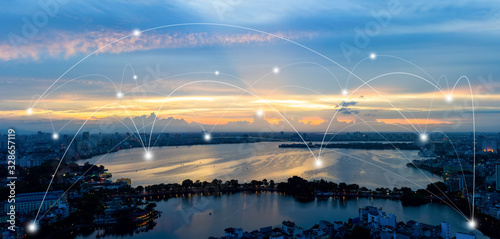 Smart city and wireless communication network concept. Digital network connection lines of Hanoi city at West Lake or Ho Tay