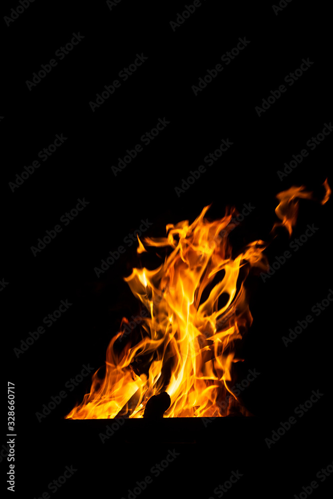 Danger fire on a dark background. Background from fire. Fire pattern can be used in design