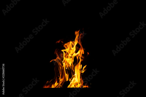 Danger fire on a dark background. Background from fire. Fire pattern can be used in design