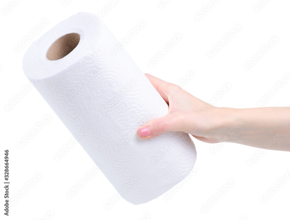 Fototapeta premium Roll white paper towel napkin in hand on white background isolation