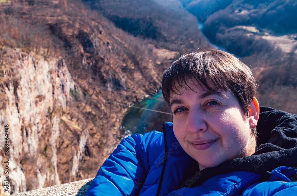 Naklejka premium Young Woman in the Mountains