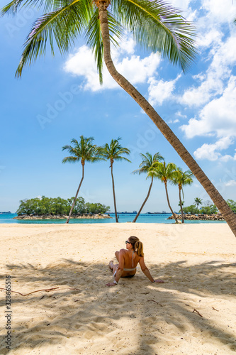 Woman at the beach in Sentosa island © Netfalls