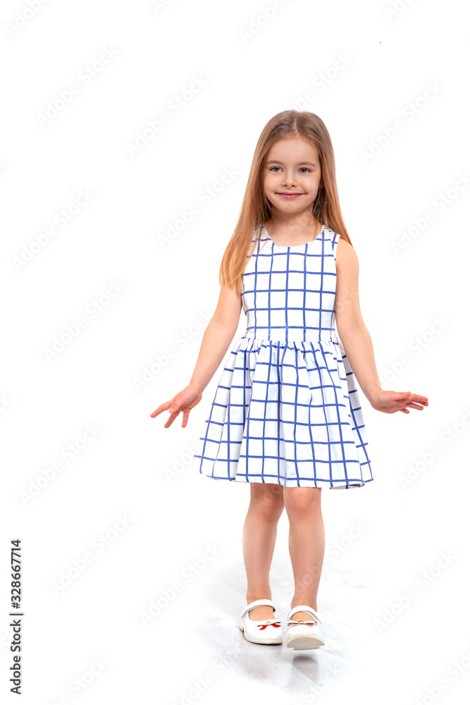 Shot of a young smiling girl with long blonde hair against white background with copy space in studio Shot of a young smiling girl with long blonde hair against white background with copy space in studio