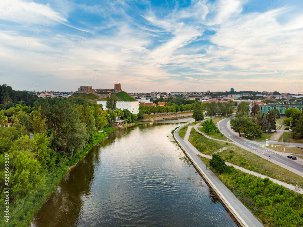 Beautiful aerial landscape of Neris river winding through Vilnius city.