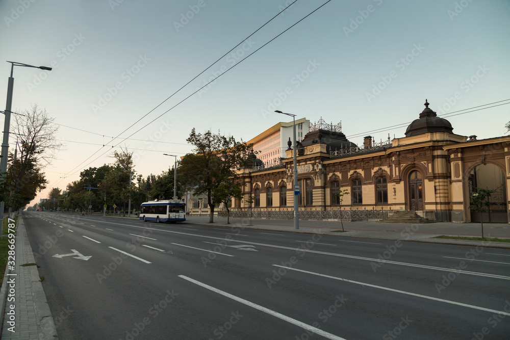 Beautiful morning in the main street of the city.