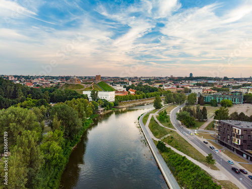 Beautiful aerial landscape of Neris river winding through Vilnius city. © MNStudio