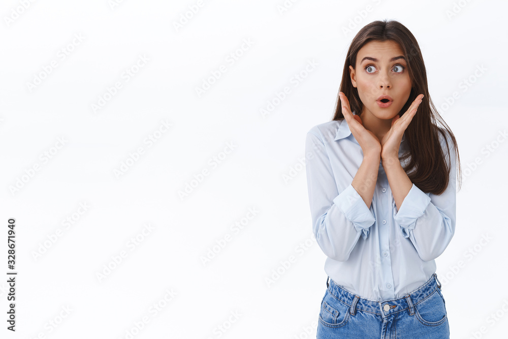 Girl hear interesting rumor cant believe her own ears. Amazed and impressed young woman looking left astonished gasping and folding lips in awe, hold hands near face as being stunned with gossips Girl hear interesting rumor cant believe her own ears. Amazed and impressed young woman looking left astonished gasping and folding lips in awe, hold hands near face as being stunned with gossips