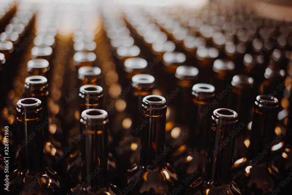 Industrial view bottle wine. Close up winery factory. Industrial view bottle wine. Close up winery factory.