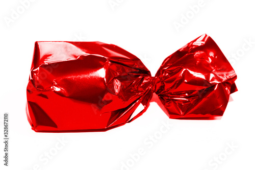 Foto Red candy wrapped isolated on white