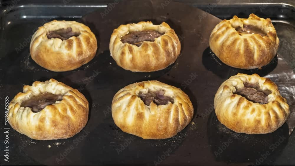 Cooking open meat pies in the oven, time lapse, Cooking open meat pies in the oven, time lapse,