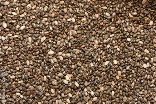 Mixed red, white and black quinoa as an abstract background texture