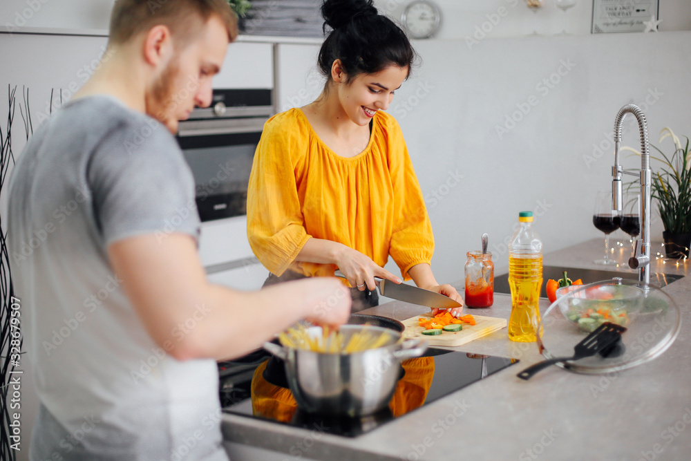 Ppeople cooking pasta. Happy family having spaghetti dinner Ppeople cooking pasta. Happy family having spaghetti dinner