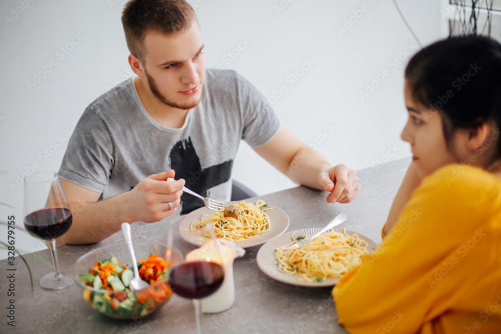 Ppeople cooking pasta. Happy family having spaghetti dinner Ppeople cooking pasta. Happy family having spaghetti dinner