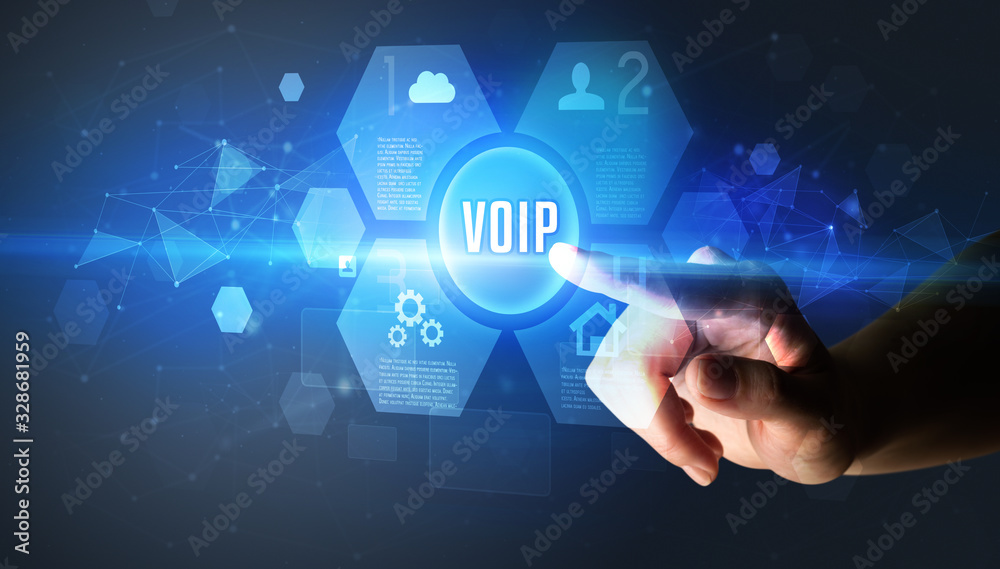 Hand touching VOIP inscription, new technology concept Hand touching VOIP inscription, new technology concept