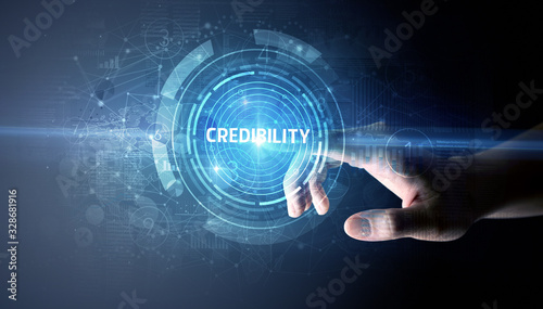 Hand touching CREDIBILITY button, modern business technology concept