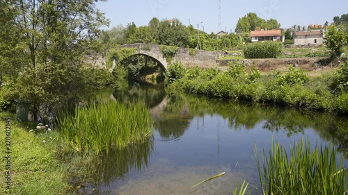Mondim de Basto beautiful antique roman medieval bridge landscape and cabril river, in Portugal photo