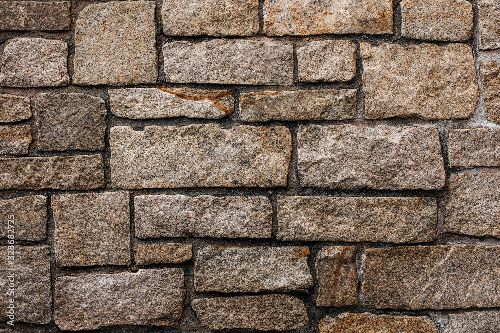 Fototapeta premium Schöne alte Steinmauer als Hintergrund.