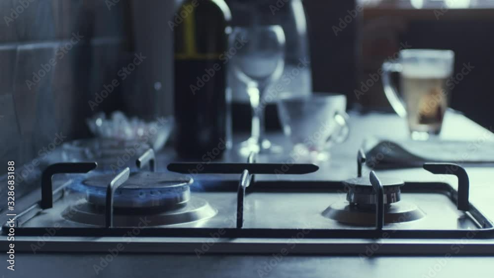 Gas stove ignition, slow motion, shallow depth of field Gas stove ignition, slow motion, shallow depth of field
